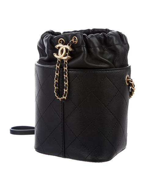 chanel black bucket bag.